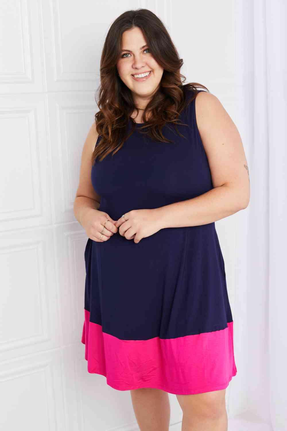 Yelete Full Size Two-Tone Sleeveless Mini Dress with Pockets Navy Fuchsia