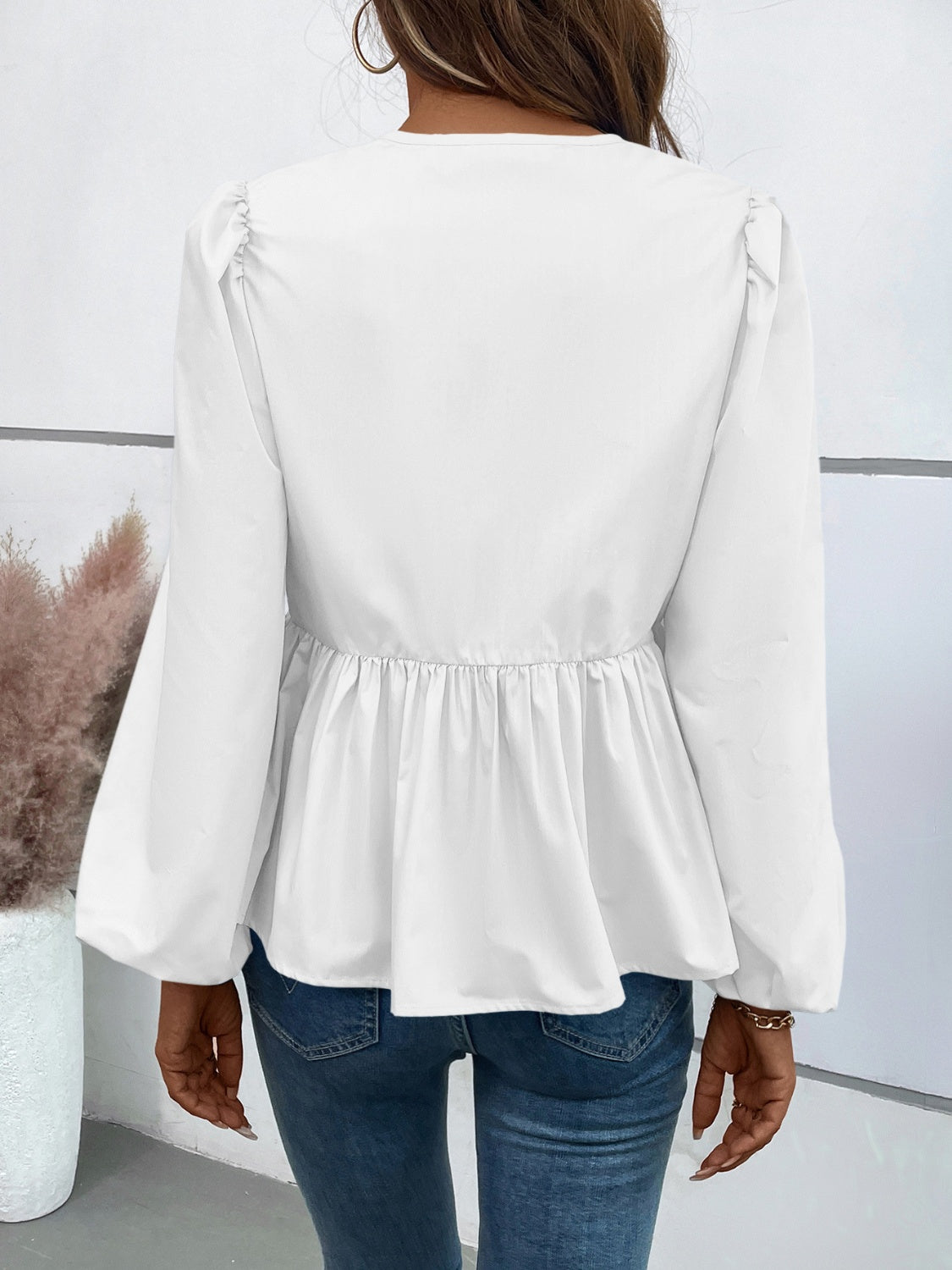 Ivy Lane Peplum Tied Long Sleeve Blouse