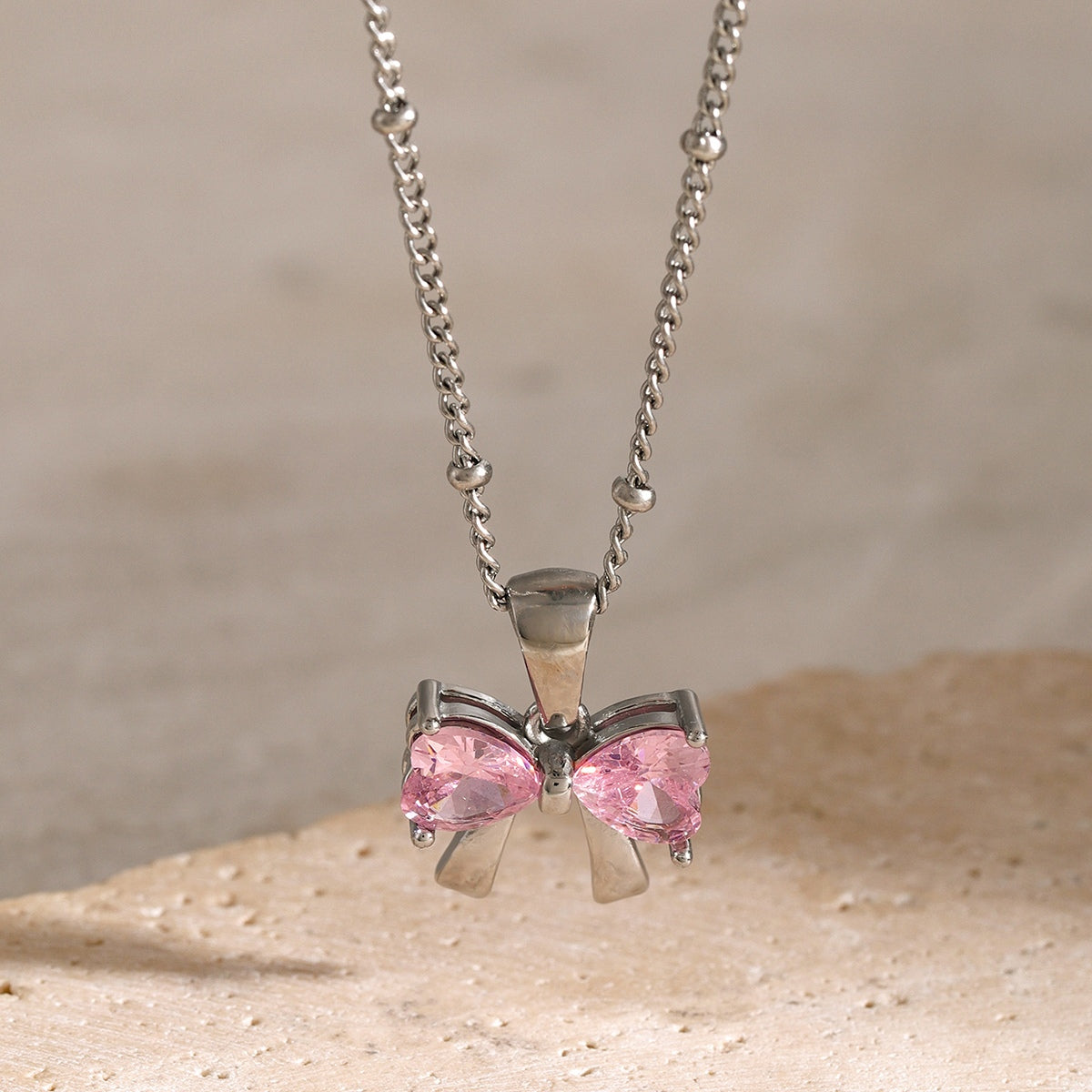 Stainless Steel Inlaid Zircon Bow Necklace